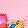 Celebration Flat lay. Candy with colorful party items on pink ba Royalty Free Stock Photo