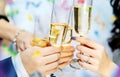 Celebration. Hands holding the glasses of champagne and wine making a toast. Royalty Free Stock Photo