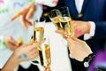 Celebration. Hands holding the glasses of champagne and wine making a toast. Royalty Free Stock Photo