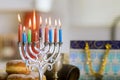 The celebration of Hanukkah is based on the Judaism tradition of lighting candles in a menorah as a symbol of the Royalty Free Stock Photo