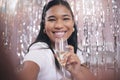 Celebration, happy birthday and champagne with woman taking selfie against party decoration for social media, happiness Royalty Free Stock Photo
