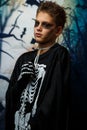 Celebration of holiday Halloween, the cute 8 year boy  in the image, costume, the skeleton theme, the vampire, bat concept Royalty Free Stock Photo