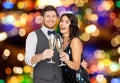 Happy couple with champagne glasses at party Royalty Free Stock Photo