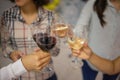 Celebration. People holding glasses of white wine making a toast. Royalty Free Stock Photo