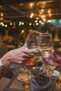 Celebration. People holding glasses of white wine making a toast. Royalty Free Stock Photo