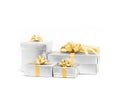 Celebration silver gift boxes with gold ribbon flower bow Royalty Free Stock Photo