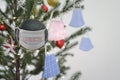 Celebration with social issuse virus corona or covid 19 concept. Christmas tree ornament with protective face mask