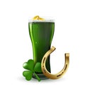 Celebration and st patricks day concept - glass of green beer with foam, green bottle, horseshoe and gold coins and on table. Royalty Free Stock Photo