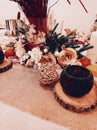 Nice table arrangement with wood and flowers