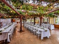 A celebration venue served with white table closes