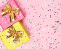Celebratory background with color gift boxes and confetti