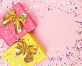 Celebratory background with color gift boxes and confetti