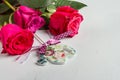 Celebratory background of roses with decor element in the form of watering can