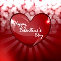 Celebratory background for Valentine`s day. For recognition. Glass heart with glare and brilliance.