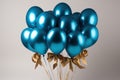 Celebratory Elegance: Blue and Gold Balloons Floating in the Air - Festive Atmosphere in Style