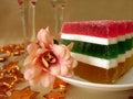 Celebratory table (Color Jelly cake and flower on plate) Royalty Free Stock Photo