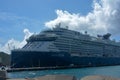 Celebrity Reflection in a Caribbean port on a sunny day.