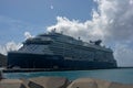 Celebrity Reflection in a Caribbean port on a sunny day.