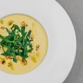 Celery cream soup with arugula