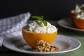 Celery salad with apple and walnuts served in orange cups