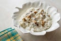 Celery Salad with Yogurt and Walnuts in Leaf Shaped Plate.