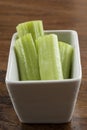 Celery Stalks in a White Bowl