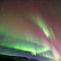 1774 Celestial Aurora Borealis: A celestial and captivating background featuring the aurora borealis with dancing lights, cosmic