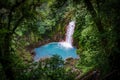 Celestial blue waterfall in volcan tenorio national park costa rica