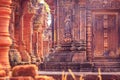 Celestial maiden carved into the red sandstone walls, Banteay Srei temple, Angkor, Cambodia Royalty Free Stock Photo