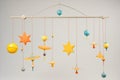 celestial mobile with planets and stars hanging from fine wires Royalty Free Stock Photo