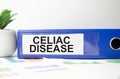 celiac disease words on the blue folder. Concept Royalty Free Stock Photo