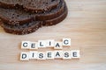 celiac disease. words written with slices of rye bread on a wooden surface Royalty Free Stock Photo