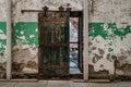 The cell block and massive wooden door in The Eastern State Penitentiary a former American prison in Philadelphia