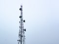 Cell Communications Tower Silhouetted Against Blue Sky Royalty Free Stock Photo