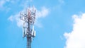 Cell phone antenna with blue sky and could with copyspace Royalty Free Stock Photo