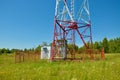 Cell phone antenna, transmitter. Telecom radio mobile antenna against blue sky Royalty Free Stock Photo