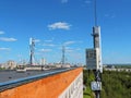 Cell phone antenna, transmitter. Telecom radio mobile antenna against blue sky Royalty Free Stock Photo