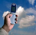 Cell phone and blue sky Royalty Free Stock Photo