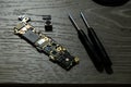 Cell phone camera module with other parts of device, service and repair concept Royalty Free Stock Photo
