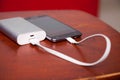 Cell Phone Charging With Power Bank Royalty Free Stock Photo