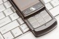 Cell Phone on Laptop Macro Royalty Free Stock Photo