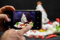 Cell phone, photographing, ingredients, christmas greeting card, snowman, christmas tree Royalty Free Stock Photo