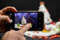 Cell phone, photographing, ingredients, christmas greeting card, snowman, christmas tree Royalty Free Stock Photo