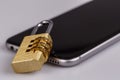 Cell phone security - lock and phone on white Royalty Free Stock Photo
