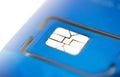 Cell phone sim card closeup view on blue plastic card Royalty Free Stock Photo