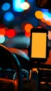 A cell phone sitting on the dashboard of a car at night Royalty Free Stock Photo