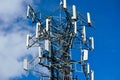 Cell Phone Tower Communication Repeater Array at a Low Angle Royalty Free Stock Photo