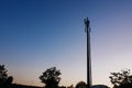 Cell phone tower / communications antenna or mast in silhouette at dusk Royalty Free Stock Photo