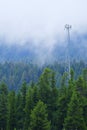 Cell Phone Tower Radio Antenna For Communication Misty Pine Forest Mountains Royalty Free Stock Photo