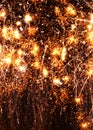 Cell phone wallpaper gold exploding fireworks black background Royalty Free Stock Photo